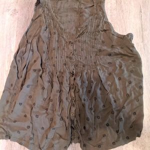 Olive green sleeveless top with owls.